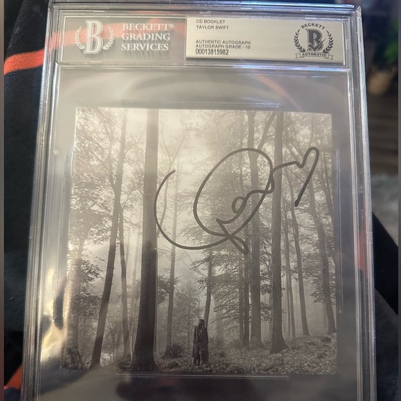 Taylor Swift Other - Taylor Swift Signed Folklore CD Booklet Cover Beckett Slabbed Autograph